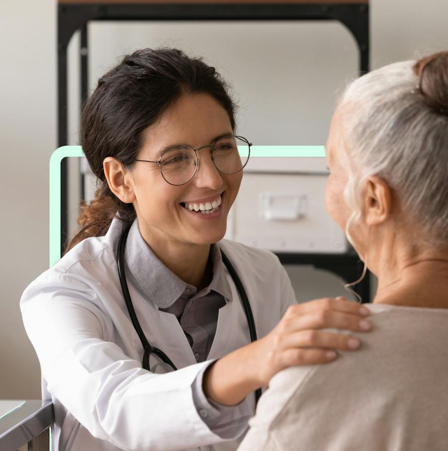 A CLS Health clinician with a patient
